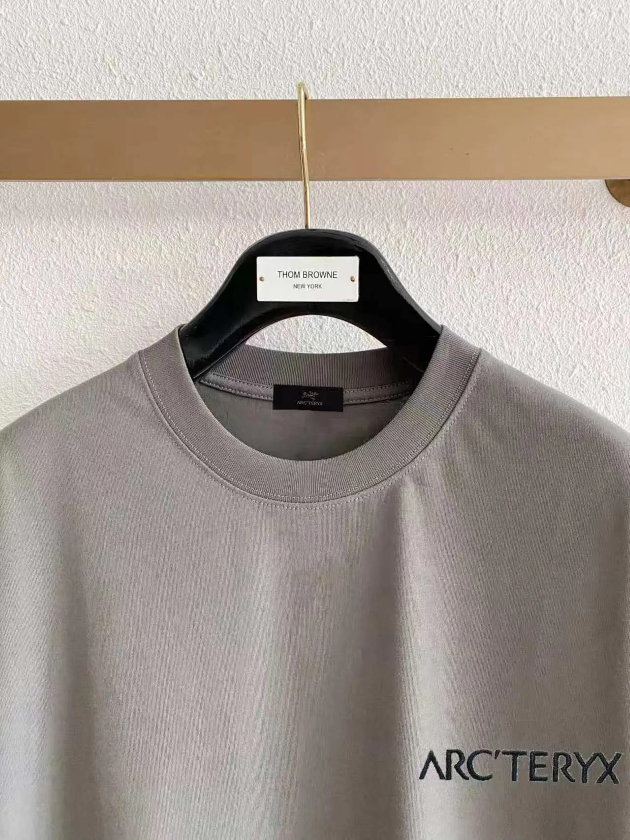 Arc’ter/ logo + New Arrival ， ， ， ， T Same Style。 :Black White Blue Gray Size:S（90-130 ） M（125-140 ） L（135-160 ） XL（160-180 ） XXL（180 ）